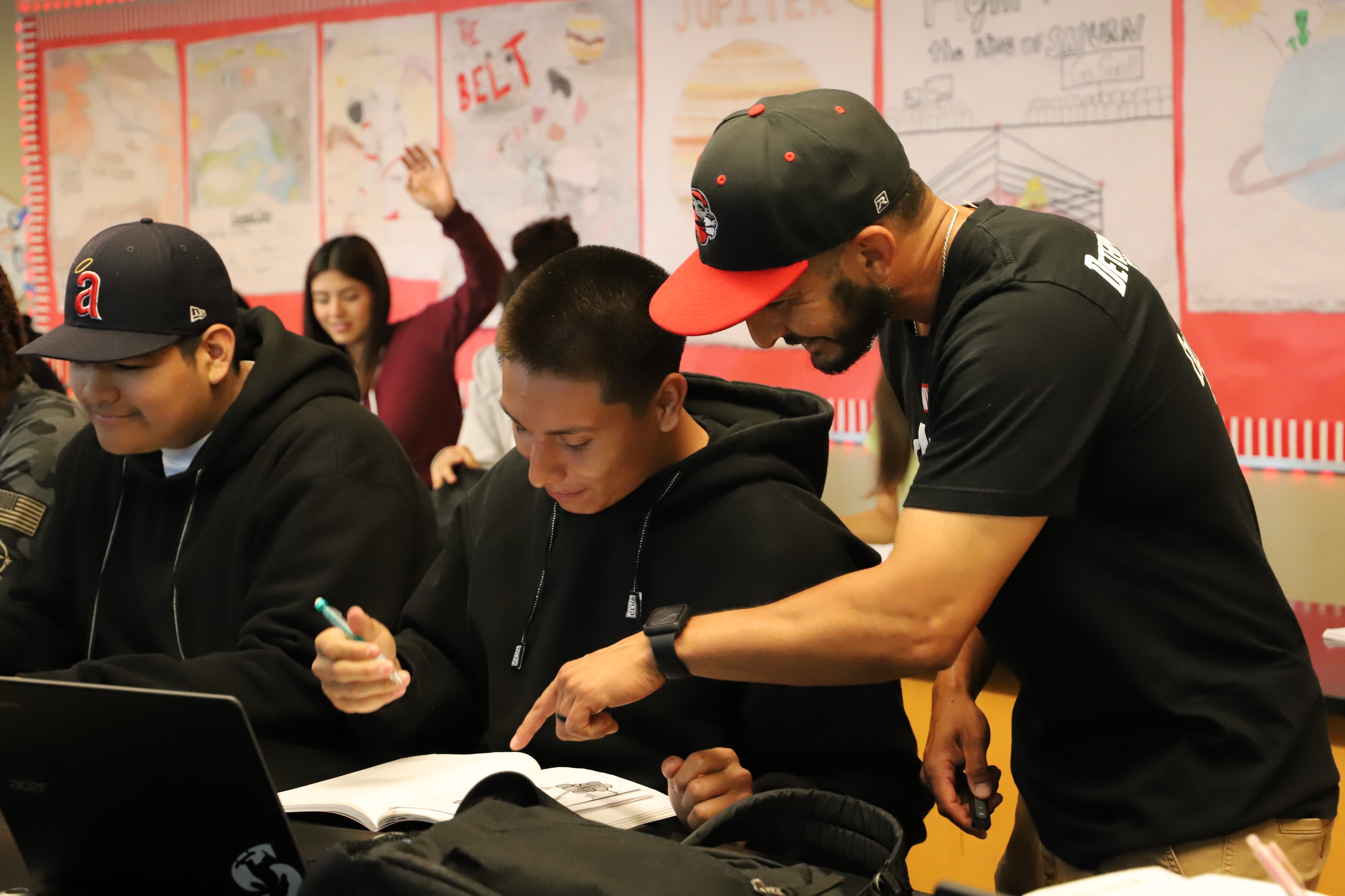 Teacher helping a student